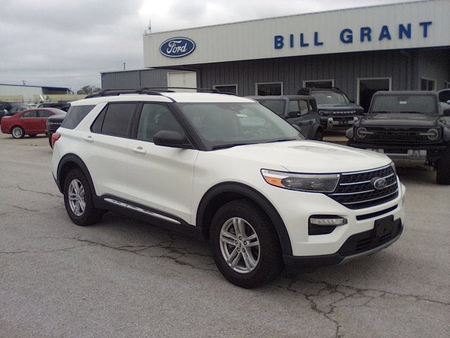 2023 Ford Explorer XLT in White — front three-quarter view